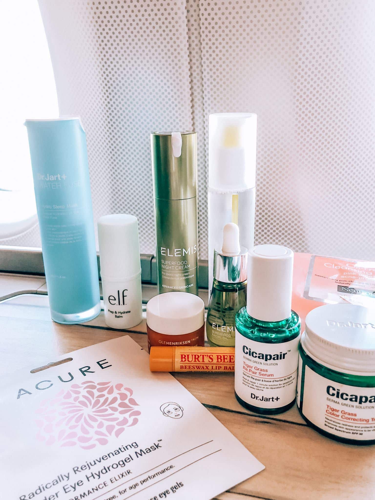 airplane beauty essentials by popular San Francisco travel blogger, What The Fab