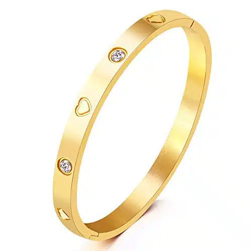 Yellow gold Cartier love bracelet dupe with rhinestone and heart detail.