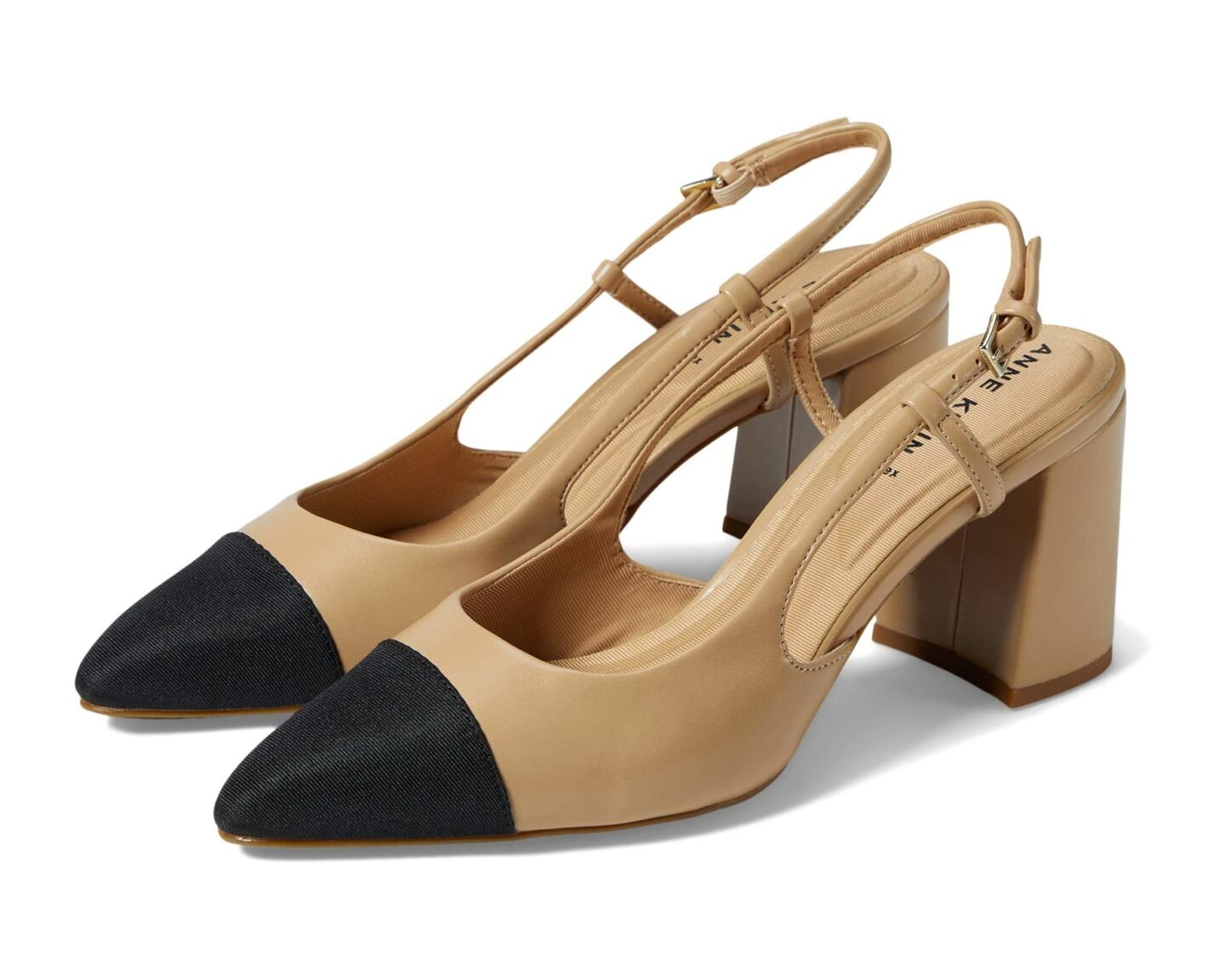 Anne Klein Brinlee pointed toe pumps in nude and black leather.