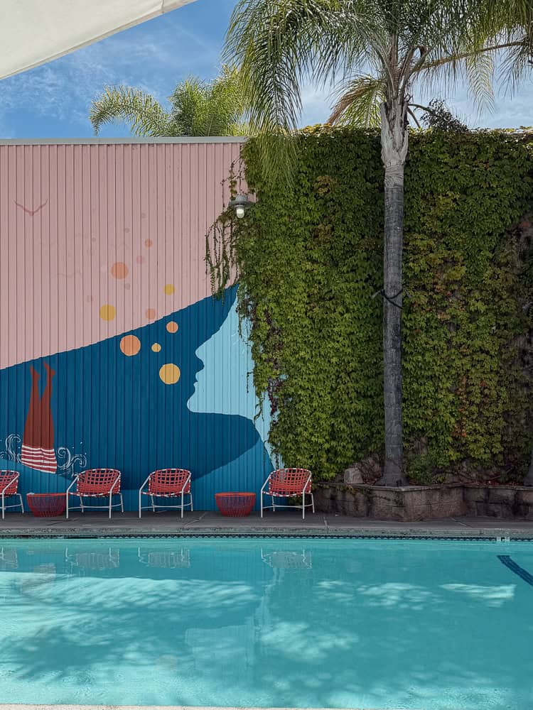 Geothermal mineral pool and poolside mural at Dr. Wilkinson's Backyard Resort, Calistoga