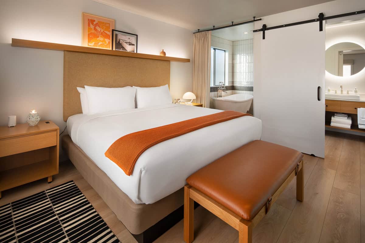 Spa Cottage king bed and mid-century decor at Dr. Wilkinson's Resort, Calistoga